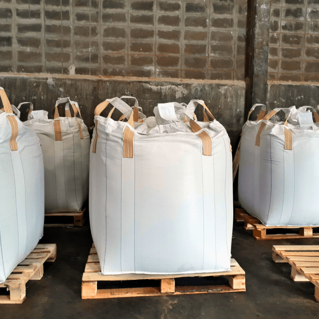 Heavy-duty bulk packaging FIBCs with brown straps.