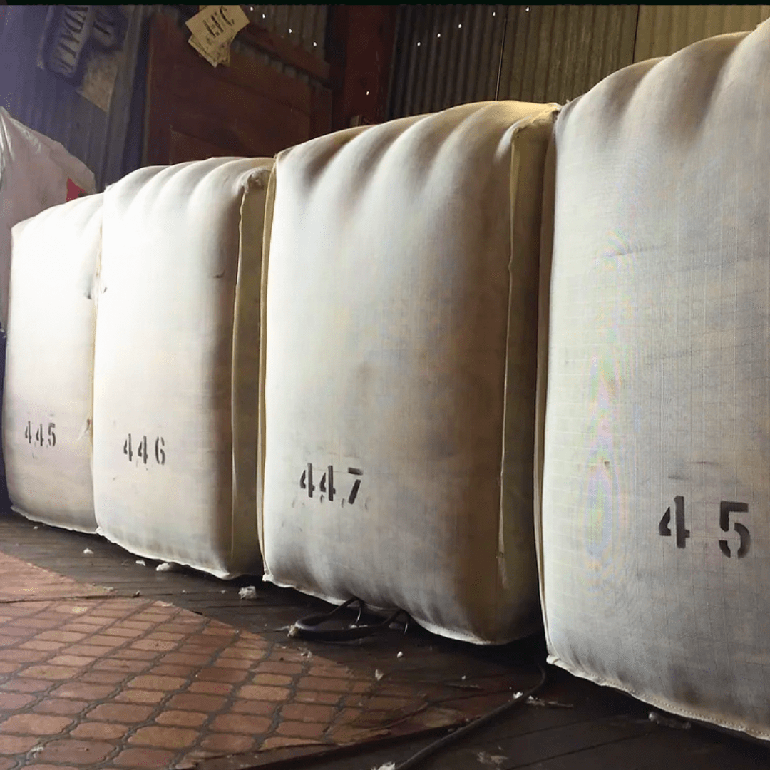 Heavy-duty woolpacks in a farm shed.