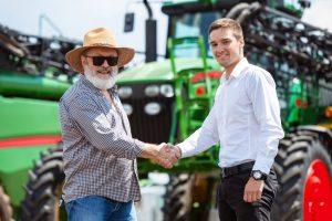 Territory manager pacific northwest chats to farmer.