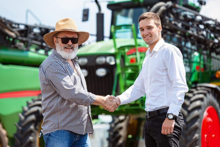 Territory manager pacific northwest chats to farmer.
